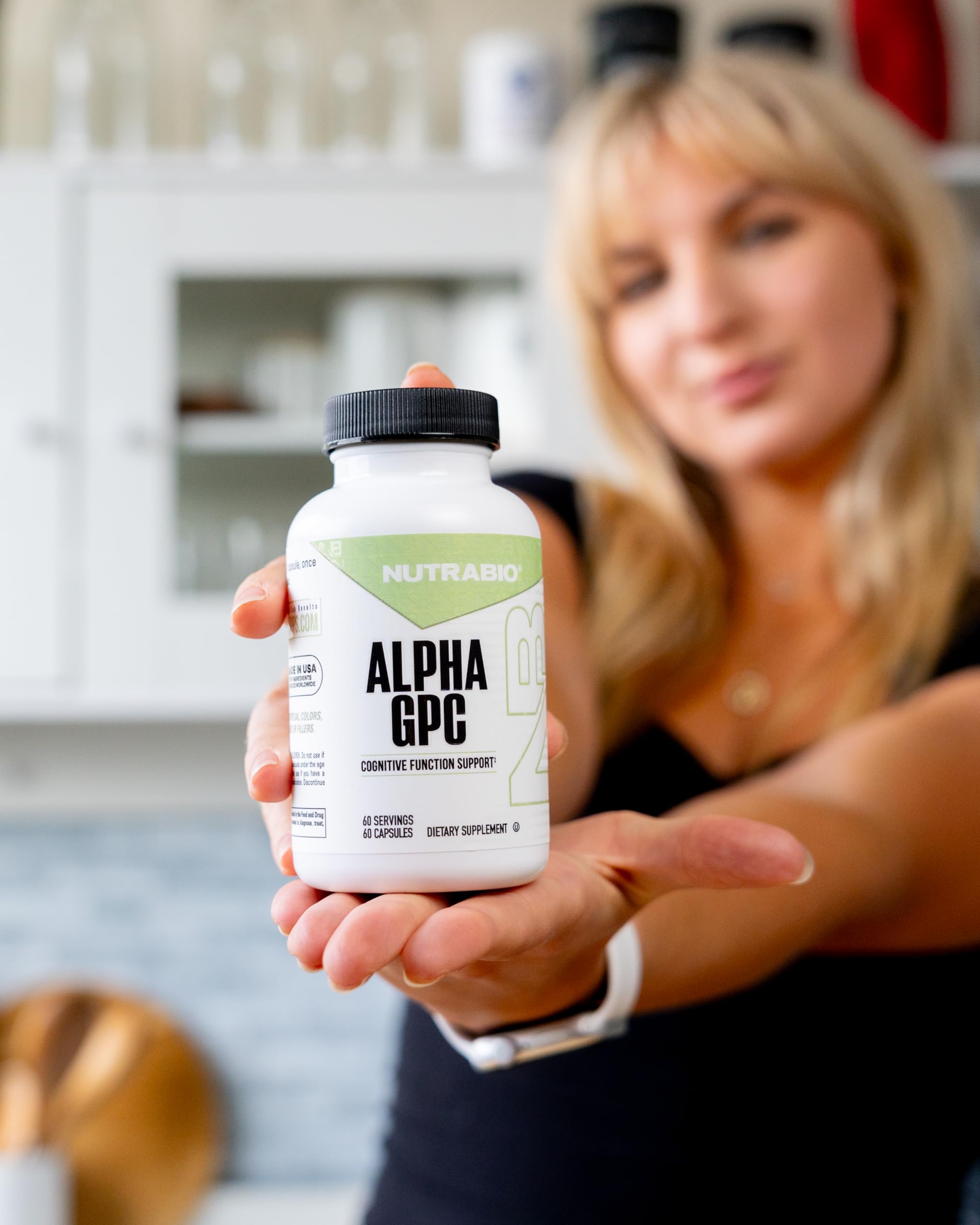 NutraBio Alpha Lipoic Acid 300mg capsules on a wooden table