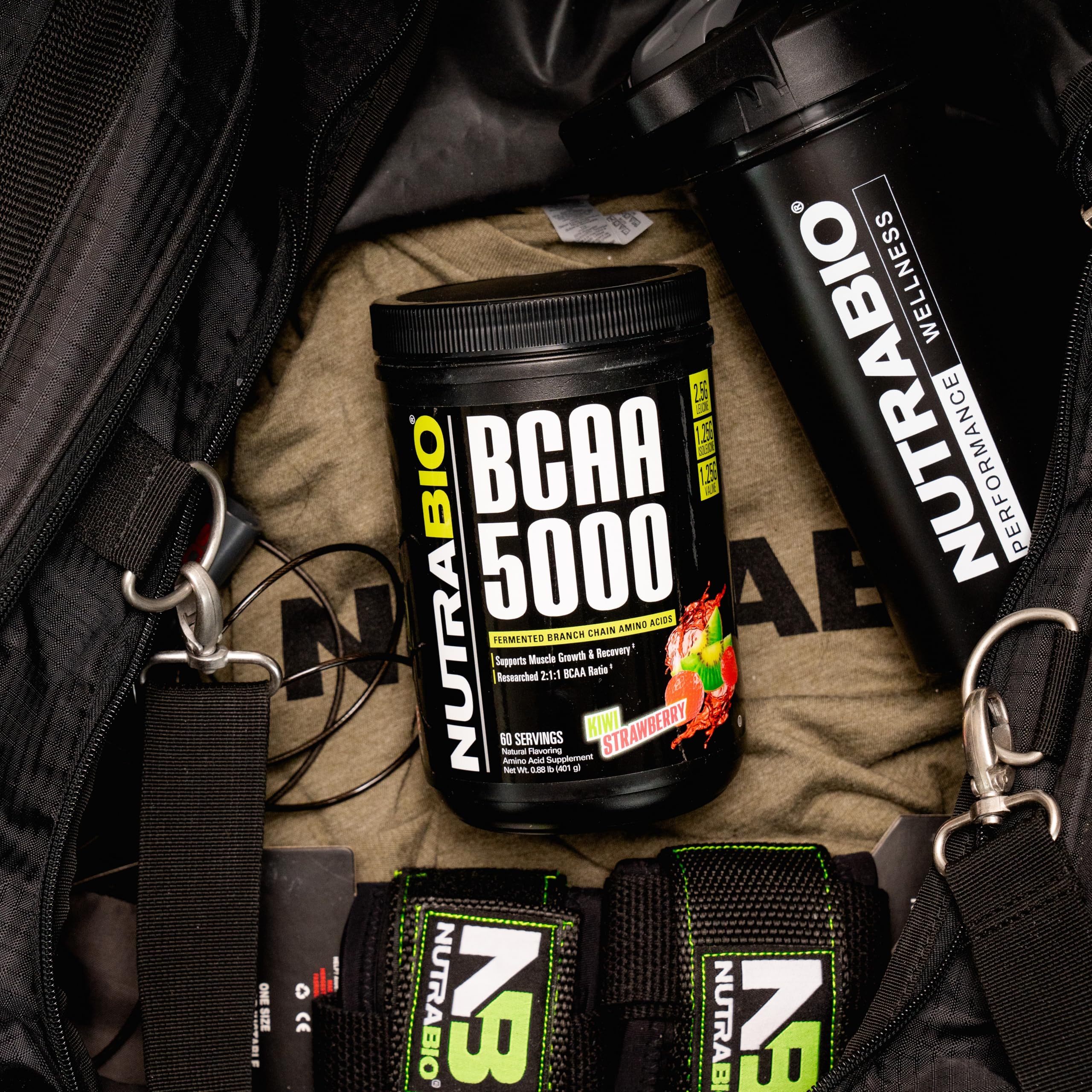 NutraBio BCAA 5000 444g product with fitness background