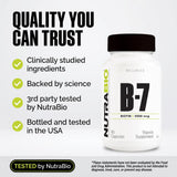 NutraBio Biotin B-7 supplement close-up of capsules