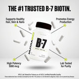 NutraBio Biotin B-7 supplement on wooden table