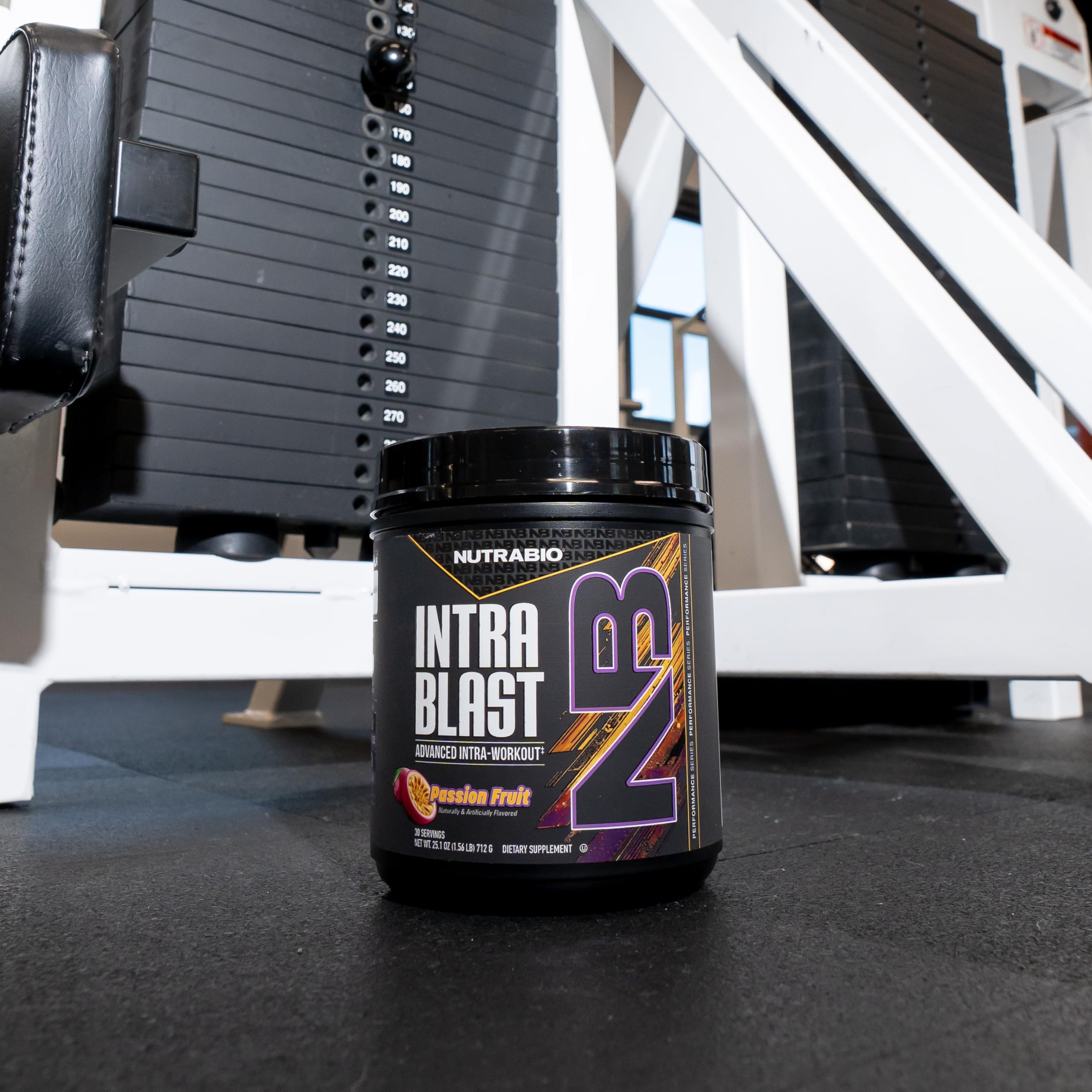NutraBio Intra Blast BCAA Powder 726g on a fitness mat