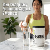 NutraBio L-Lysine 500g powder with a spoon