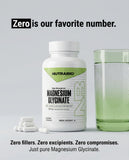 NutraBio Magnesium Glycinate 350mg capsules on wooden table
