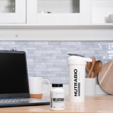 NutraBio Melatonin Sleep Aid 3mg capsules in hand