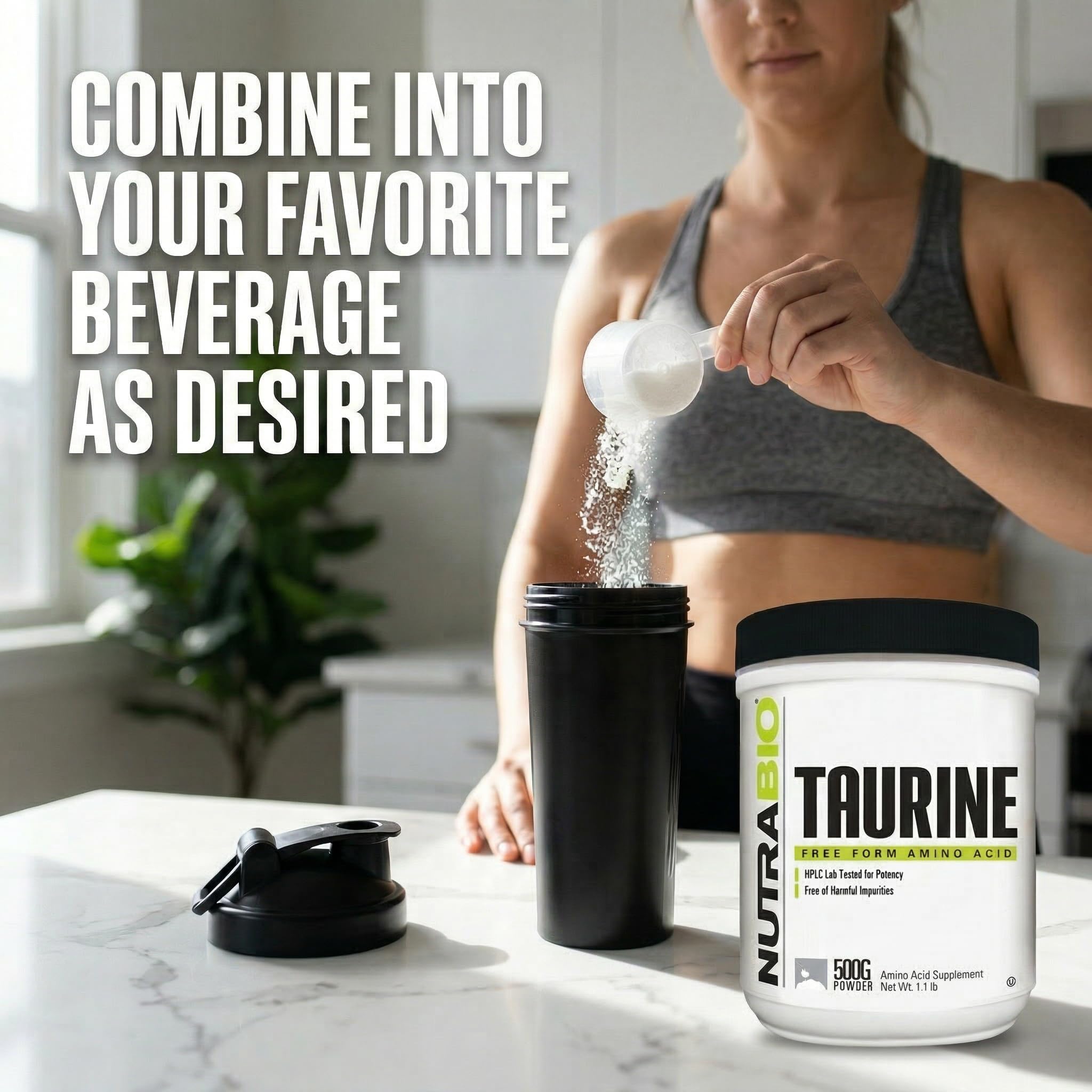 NutraBio Taurine Powder 500g on a wooden table