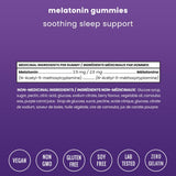 NutraChamps Sleep Gummies on a wooden table with a glass of water