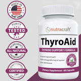 Nutracraft ThyroAid capsules displayed on a wooden surface