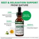 NutraMedix Babuna Calm Drops in a glass of water
