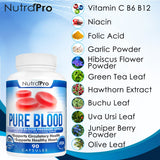 NutraPro Pure Blood capsules displayed on a wooden surface