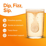 nutrazul daily wellness Triple Action Vitamin C 1000mg effervescent tablet in glass of water