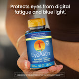 Nutrex Hawaii EyeAstin capsules in a hand