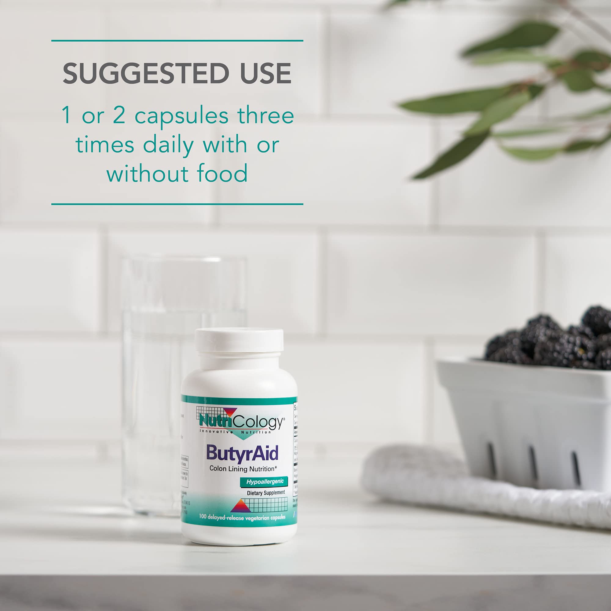 NutriCology ButyrAid 68g supplement with a measuring spoon for dosage
