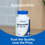 Nutricost Astaxanthin Softgels 12mg bottle on a kitchen counter