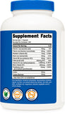 Nutricost B-Complex Vitamins capsules in a glass