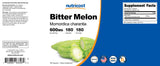 Nutricost Bitter Melon Extract capsules in a hand