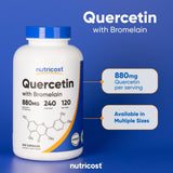 Nutricost Bromelain Quercetin capsules on a wooden surface