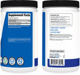 Nutricost Creatine Monohydrate with measuring scoop on a table