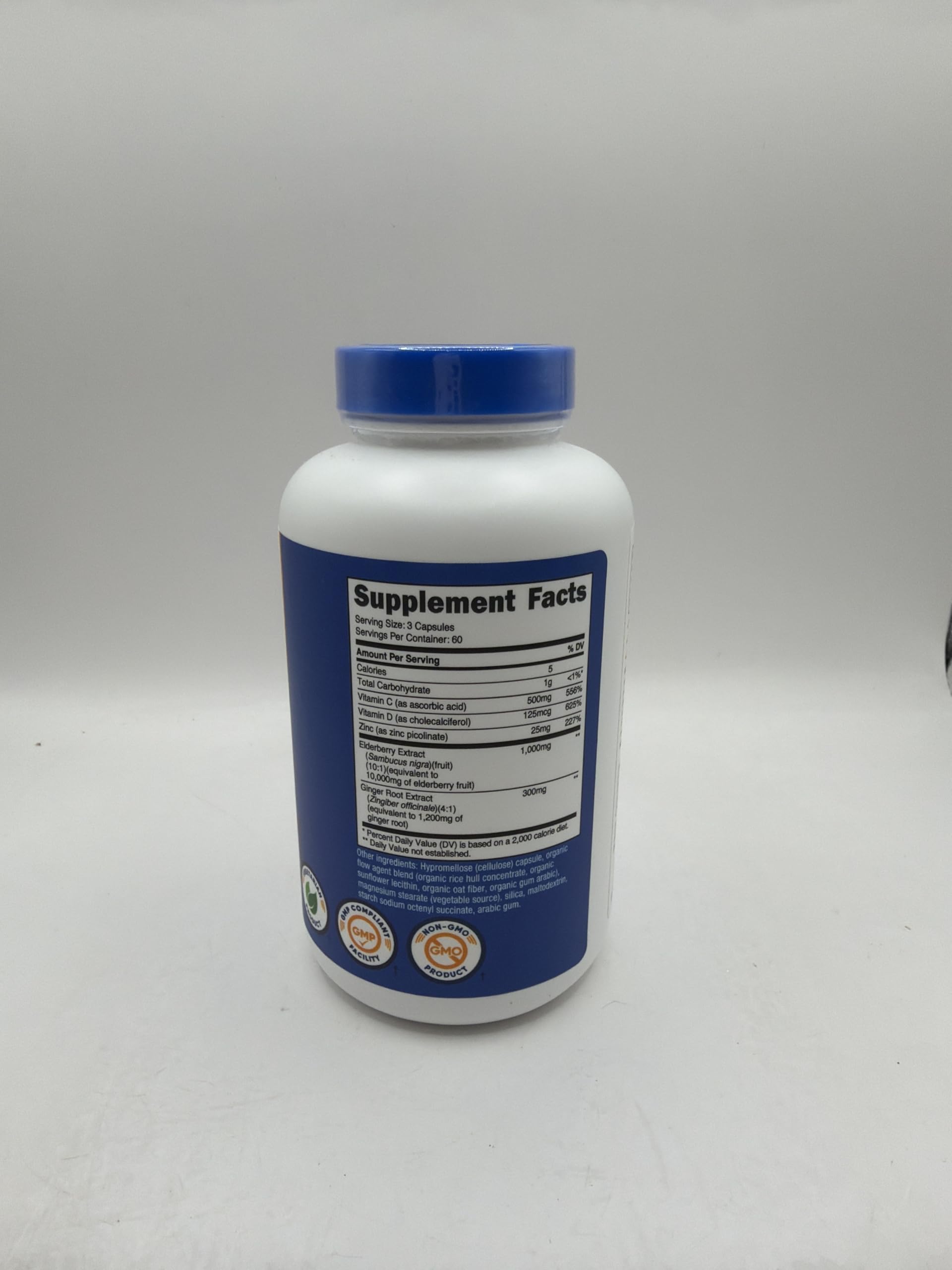 Nutricost Elderberry Extract 1000mg with a measuring spoon