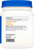 Nutricost L-Tyrosine Powder 500g with a scoop on a wooden table