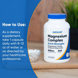 Nutricost Magnesium Complex capsules on a wooden table
