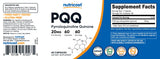 Nutricost Pyrroloquinoline Quinone 20mg capsules on a wooden table