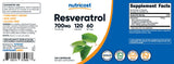 Nutricost Resveratrol Supplement 700mg on a wooden table