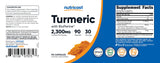 Nutricost Turmeric Supplement displayed with herbs