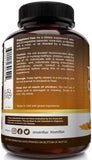 NutriFlair Turmeric Curcumin bottle on a wooden table