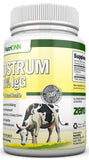 NutriONN Colostrum 100g product displayed on a kitchen counter