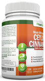 NutriONN Organic Ceylon Cinnamon capsules in a hand