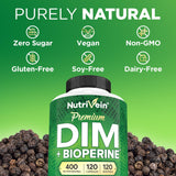 Nutrivein DIM Supplement 400mg capsules in a hand