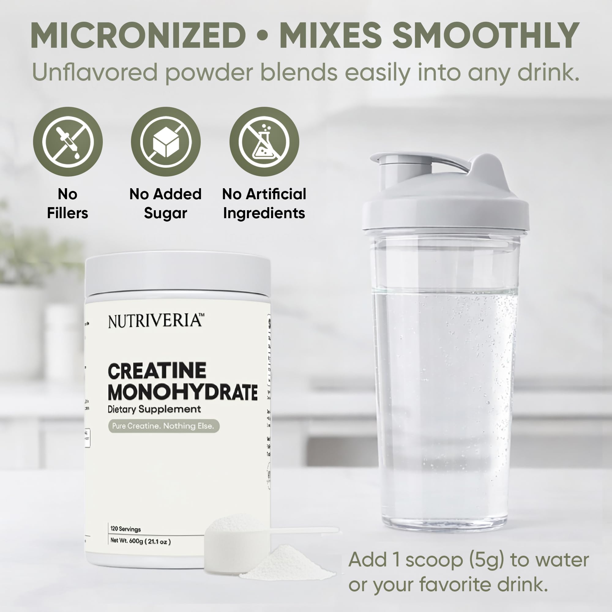 Nutriveria Creatine Monohydrate 601g powder in a scoop