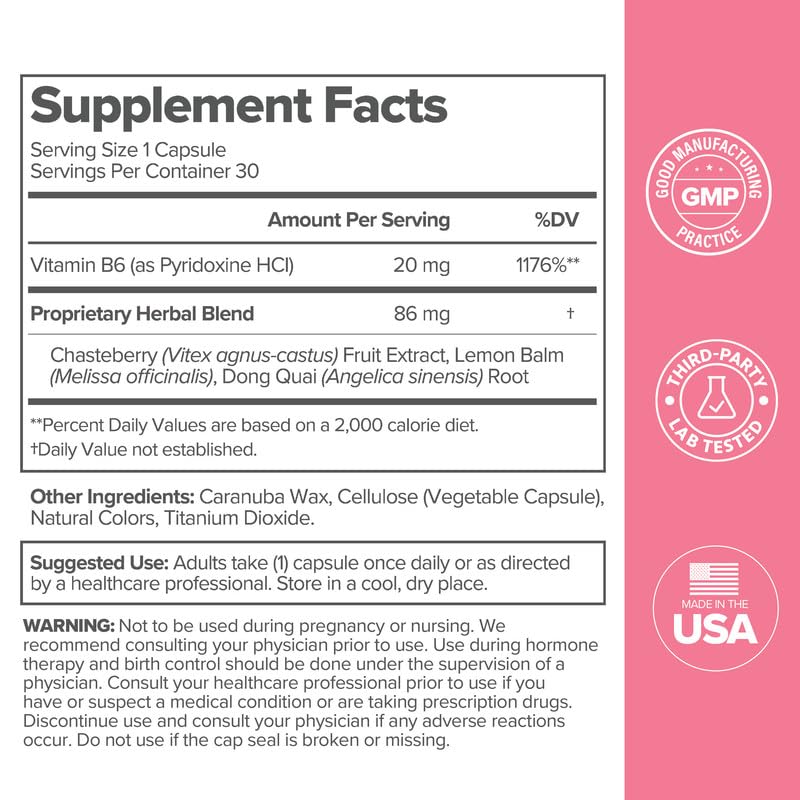 O Positiv FLO PMS Relief capsules on a wooden table