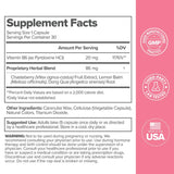 O Positiv FLO PMS Relief capsules on a wooden table