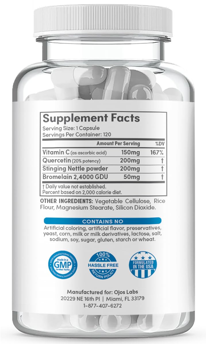 OjosLabs Advanced Histamine Defense capsules on a wooden table