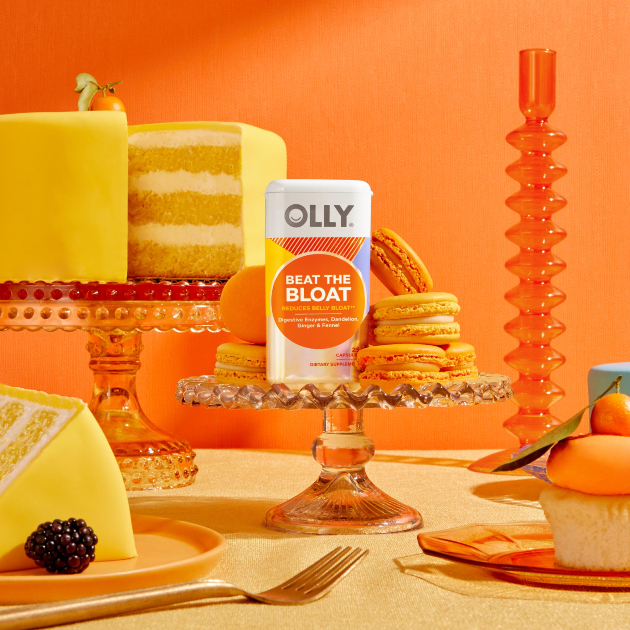 OLLY Beat the Capsules lifestyle scene with a glass of water
