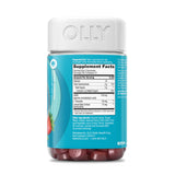 OLLY Goodbye Stress Gummies displayed with fresh strawberries