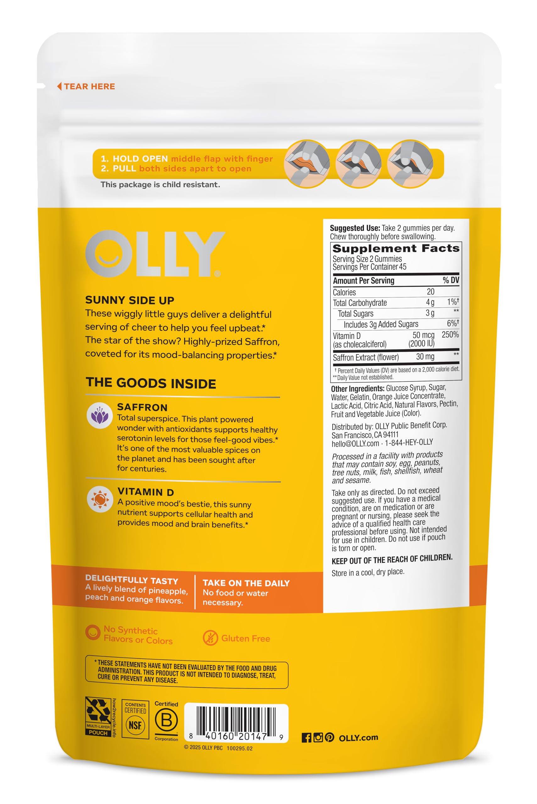 OLLY Hello Happy Gummy Worms bottle with a measuring spoon