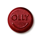 OLLY Kids Sleep Gummies in a child's hand