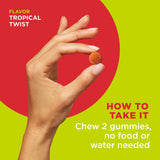 OLLY Multi + Probiotic Gummies with tropical fruits background