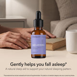 Olympian Labs Melatonin Fast Dissolve Tablets with a glass of water