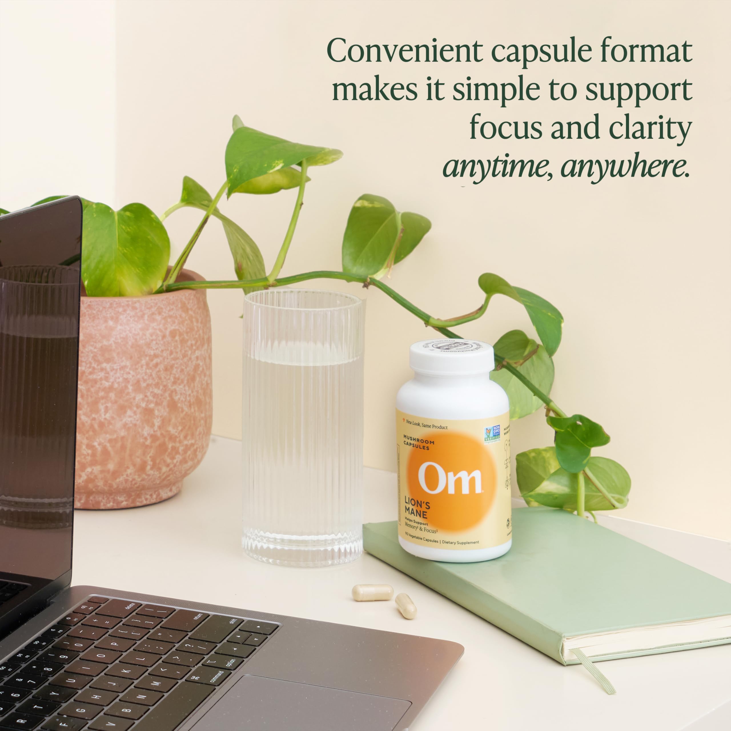 OM MUSHROOM SUPERFOOD Lion's Mane Mushroom Capsules on a wooden table