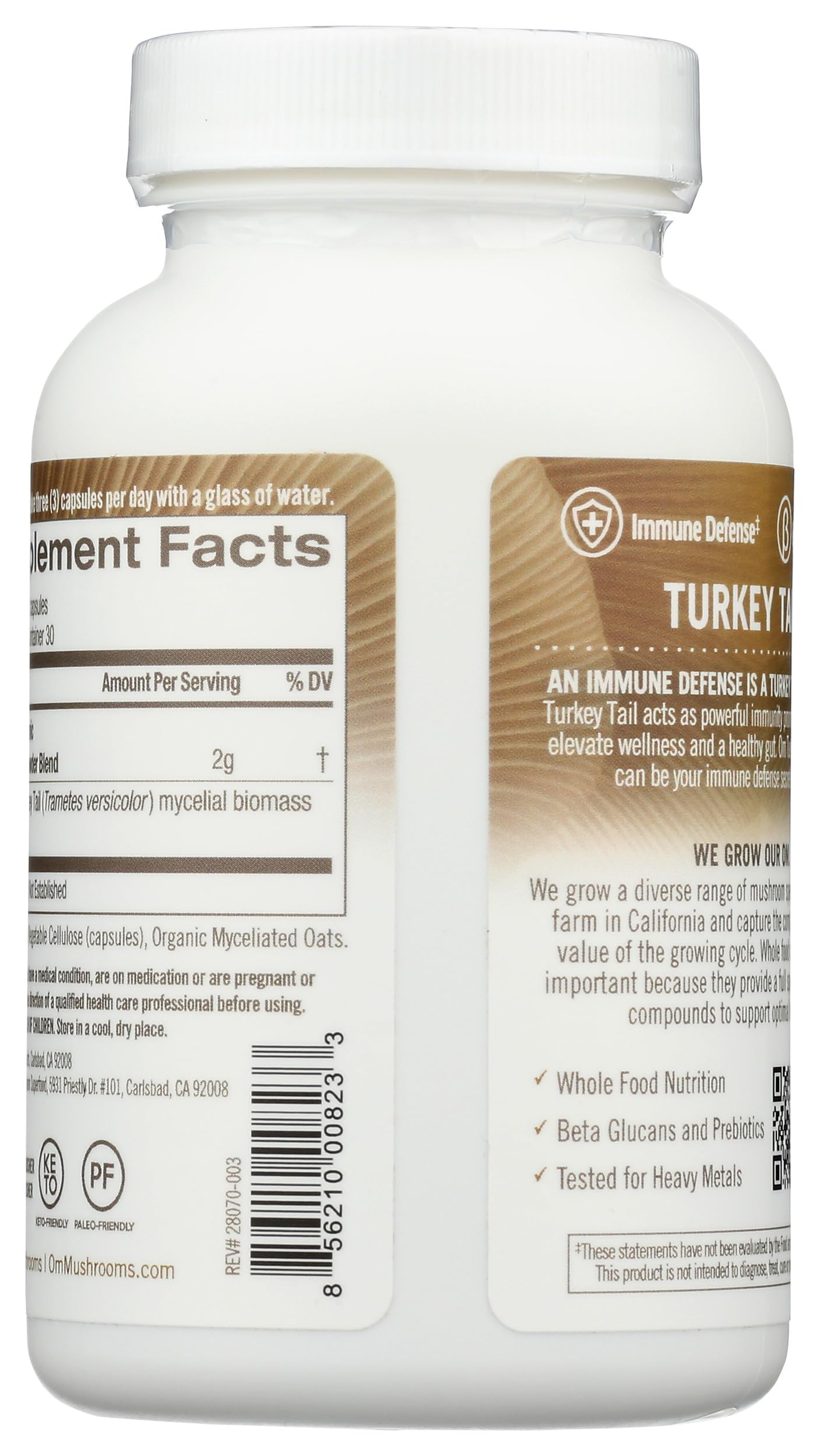 OM MUSHROOM SUPERFOOD Turkey Tail Mushroom Capsules on a wooden table