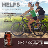 OmniBiotics Zinc Picolinate capsules on a wooden table