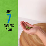On Target Living Organic Wheatgrass Tablets with a measuring spoon