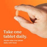 ONE A DAY Women's 50 Plus Multivitamin with a glass of water