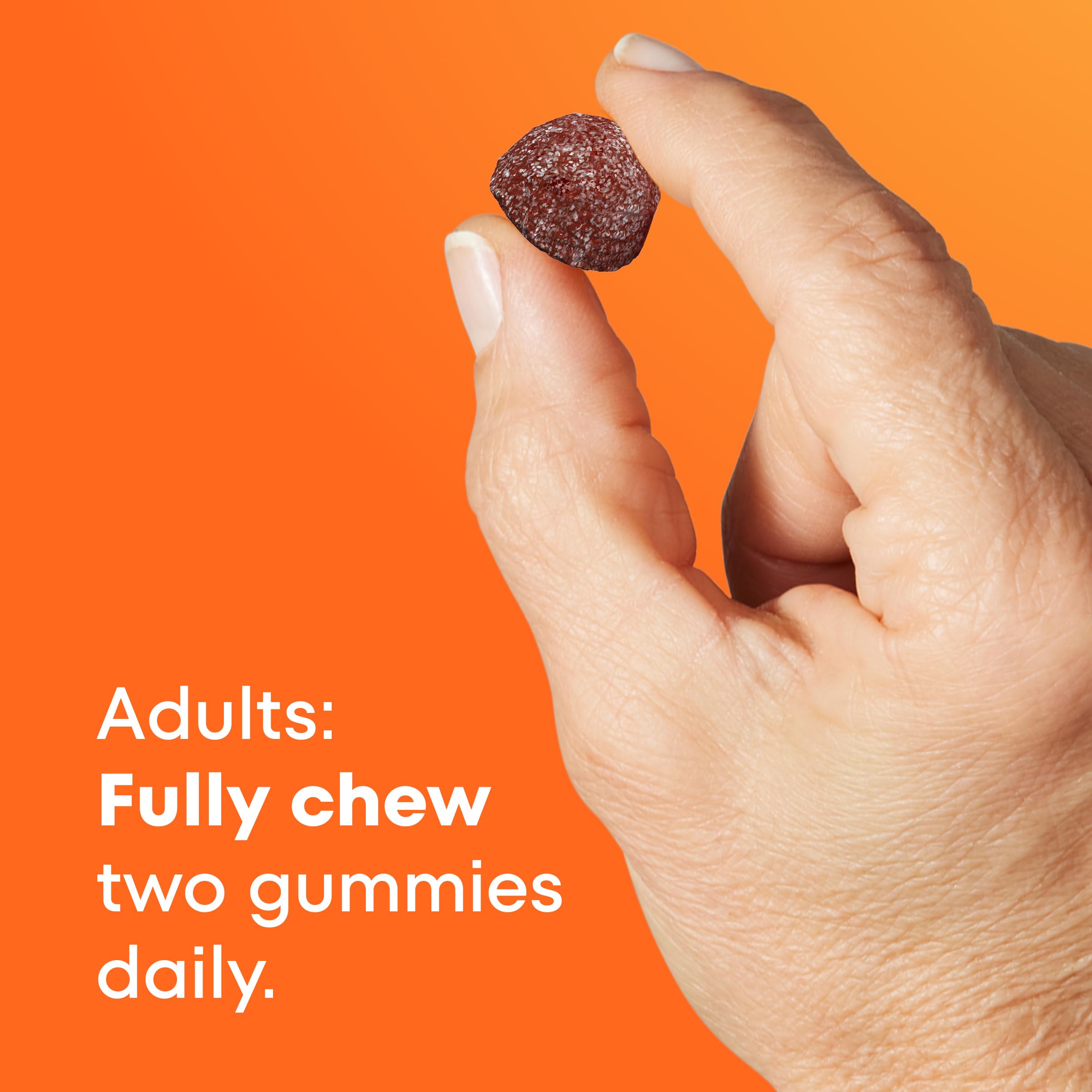 ONE A DAY Women's Multivitamin Gummies 50+ on a wooden table