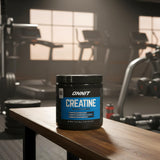 ONNIT Creatine Monohydrate 590g on a gym bench