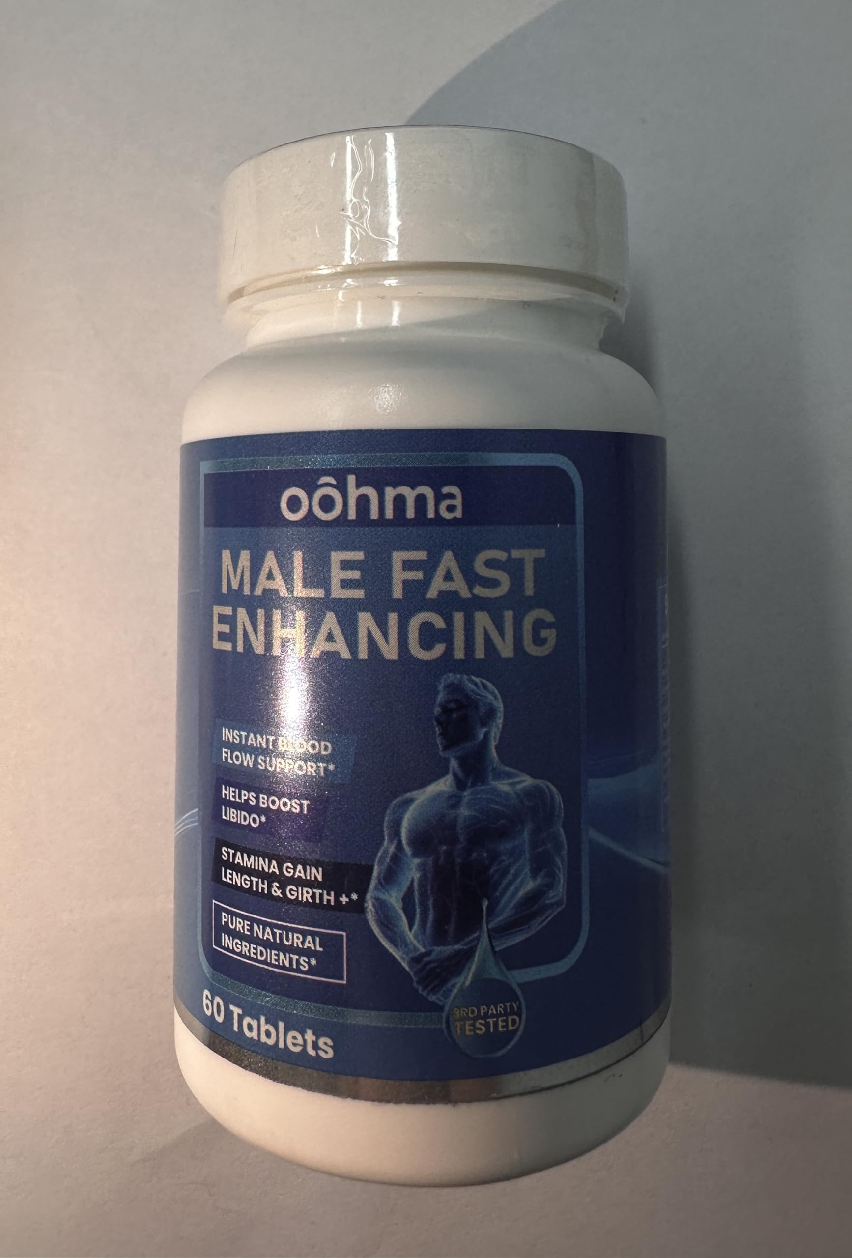 Oohma Blended Vitamin & Mineral Supplement with water glass
