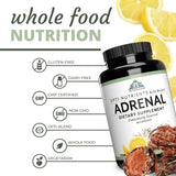 Optimal Health Systems Adrenal Extracts on a wooden table with natural elements